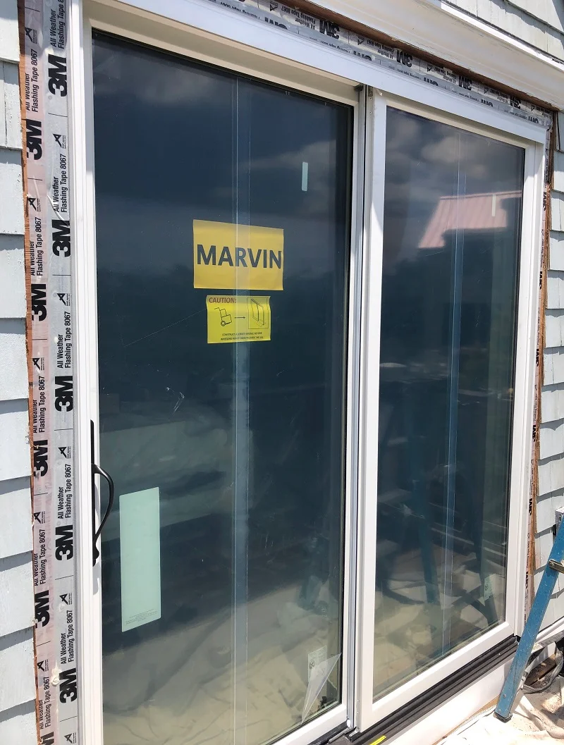 Taping and flashing the door - new construction method